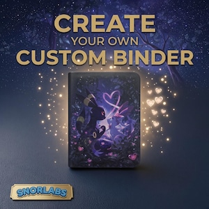 May include: A rectangular binder featuring a dark, magical forest scene with two stylized creatures facing each other, surrounded by glowing hearts and sparkles. The text "CREATE YOUR OWN CUSTOM BINDER" appears above, and a "SNORLABS" logo is at the bottom.