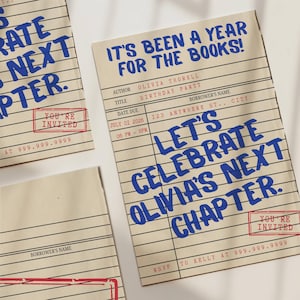 May include: A set of cream-coloured paper invitations designed to look like library checkout cards with black horizontal lines. The text reads IT'S BEEN A YEAR FOR THE BOOKS! LET'S CELEBRATE OLIVIA'S NEXT CHAPTER. Includes red YOU'RE INVITED stamps.