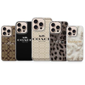 May include: Five smartphone cases featuring the Coach New York logo and horse and carriage emblem. Designs include a brown signature monogram, a solid black case, a beige monogram, a leopard print pattern, and a textured white faux fur finish.