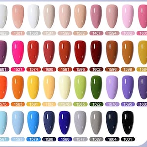 May include: A color chart displaying forty almond-shaped nail polish swatches arranged in four rows of ten. Each swatch features a unique solid color, ranging from white, nudes, and pinks to vibrant reds, oranges, yellows, greens, blues, and black.