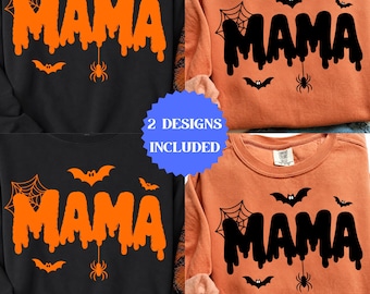 Pode incluir: Duas camisolas de gola redonda, uma preta e uma laranja, com o texto MAMA numa fonte que parece escorrer. Os designs incluem ilustrações gráficas de morcegos, uma teia de aranha e uma aranha pendurada. A camisola laranja tem gráficos pretos e a preta tem gráficos laranja.