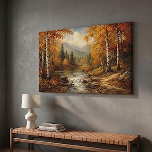 May include: A rectangular landscape painting depicting an autumn forest scene with birch trees, golden foliage, a small stream with a waterfall, and distant mountains under a cloudy sky, rendered in warm tones of orange, yellow, and brown.
