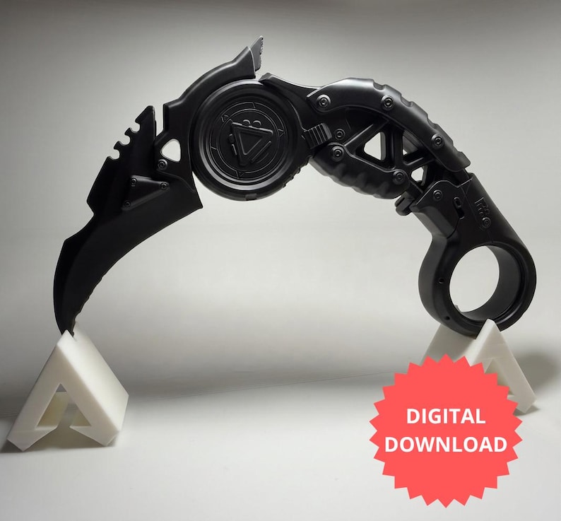 May include: A matte black curved karambit-style blade featuring a circular finger ring at the handle, a central mechanical gear-like pivot point with a triangular emblem, and a serrated spine. A red starburst graphic reads DIGITAL DOWNLOAD.