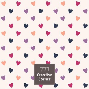May include: A repeating pattern of small hearts in shades of dark blue, magenta, purple, and peach on a light cream background. A dark gray square is centered at the bottom with the text 777 Creative Corner printed in white sans-serif font.
