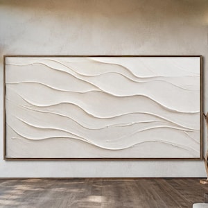 May include: A large rectangular wall art piece featuring a thick, off-white textured surface with raised, horizontal, undulating wave-like lines. The artwork is encased in a thin, simple wooden frame and mounted on a plain, light-coloured wall.
