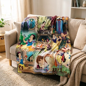May include: A soft fleece throw blanket featuring a colorful collage of scenes from the animated film Snow White and the Seven Dwarfs, including Snow White, the seven dwarfs, the Evil Queen, and the Prince, with various forest animals.