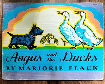 Angus y los patos, libro infantil clásico de Marjorie Flack, década de 1950, con ilustraciones litográficas de mediados de siglo.