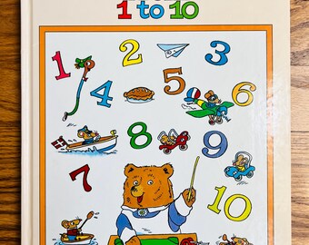 El libro infantil de conteo "First Little Learners From 1 to 10" de Richard Scarry, impreso en 1995, es un libro usado para aprender a contar para niños.