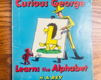 1963 Curious George de H.A. Rey, libro infantil clásico de mediados de siglo.