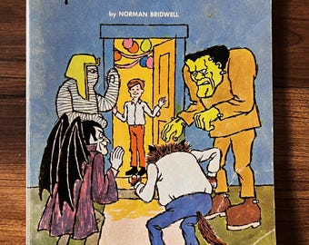 Vacaciones monstruosas, Norman Bridwell, Primera edición, 1974, Libro infantil de bolsillo