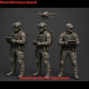 May include: Three gray resin miniature figures of drone operators in tactical gear, each holding a tablet or controller. A small drone hovers above the center figure. Text reads ResinMiniaturebank and American Drone Operators.