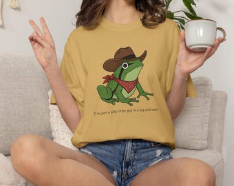 I'm just a silly little guy in a big wild west - Cowboy Frog Meme T-Shirt - Crewneck Sweatshirt - Racerback Tank