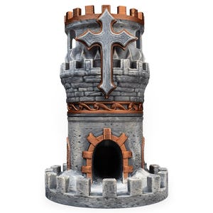 May include: A gray and copper-colored dice tower featuring a stone-textured cylindrical structure with a crenelated top, a central arched doorway, and a prominent silver-toned cross emblem mounted on the upper section of the exterior wall.