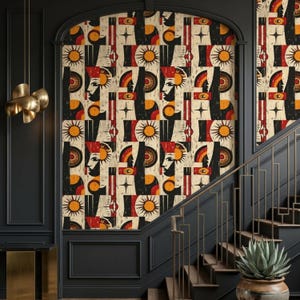 May include: Wallpaper featuring a repeating graphic pattern of stylized human profiles, suns, and geometric shapes in a palette of black, cream, red, and orange. The design includes abstract eye motifs and starburst elements arranged in a grid.