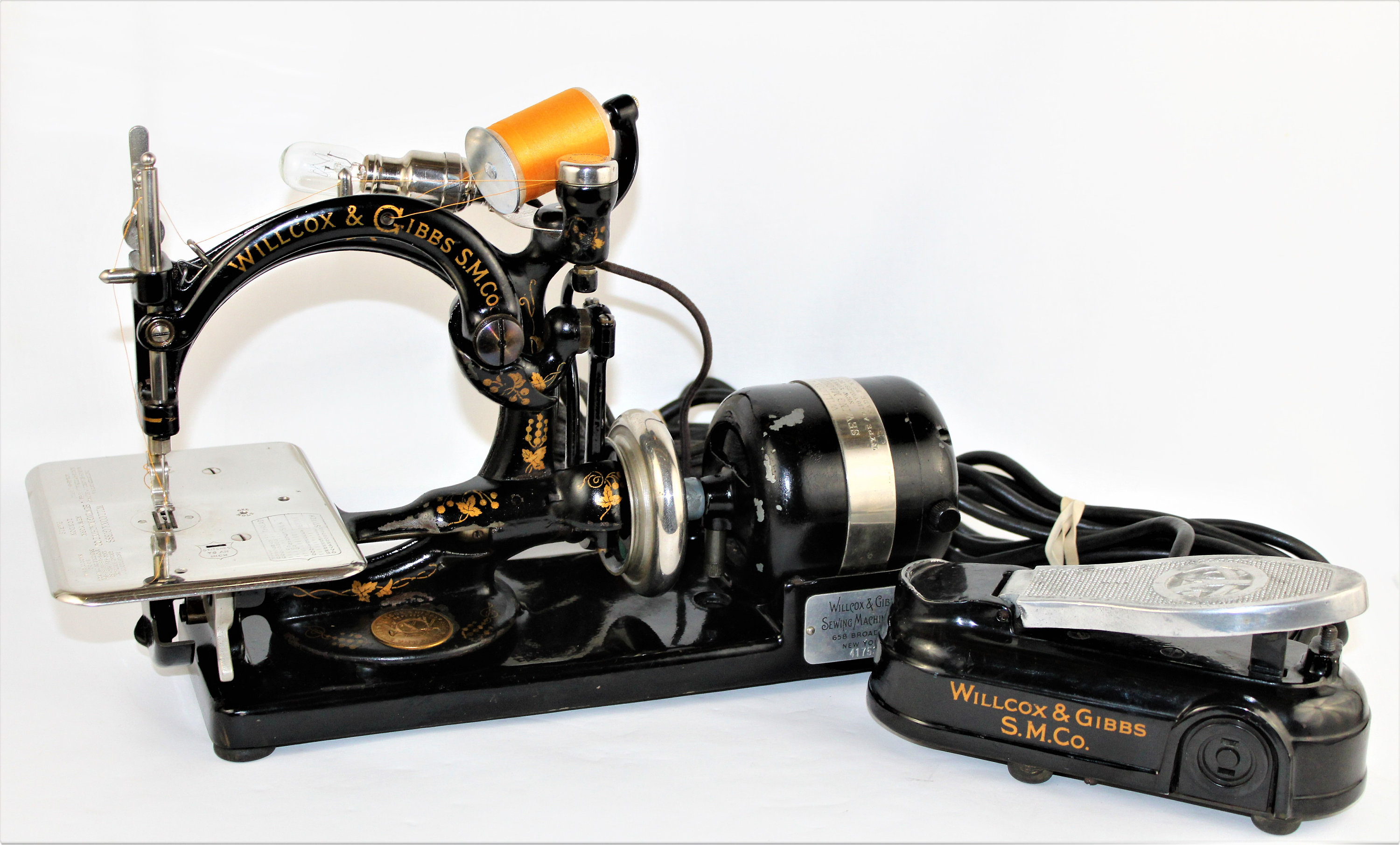 Antique Wilcox and Gibbs Sewing Machine with Case and Attachments