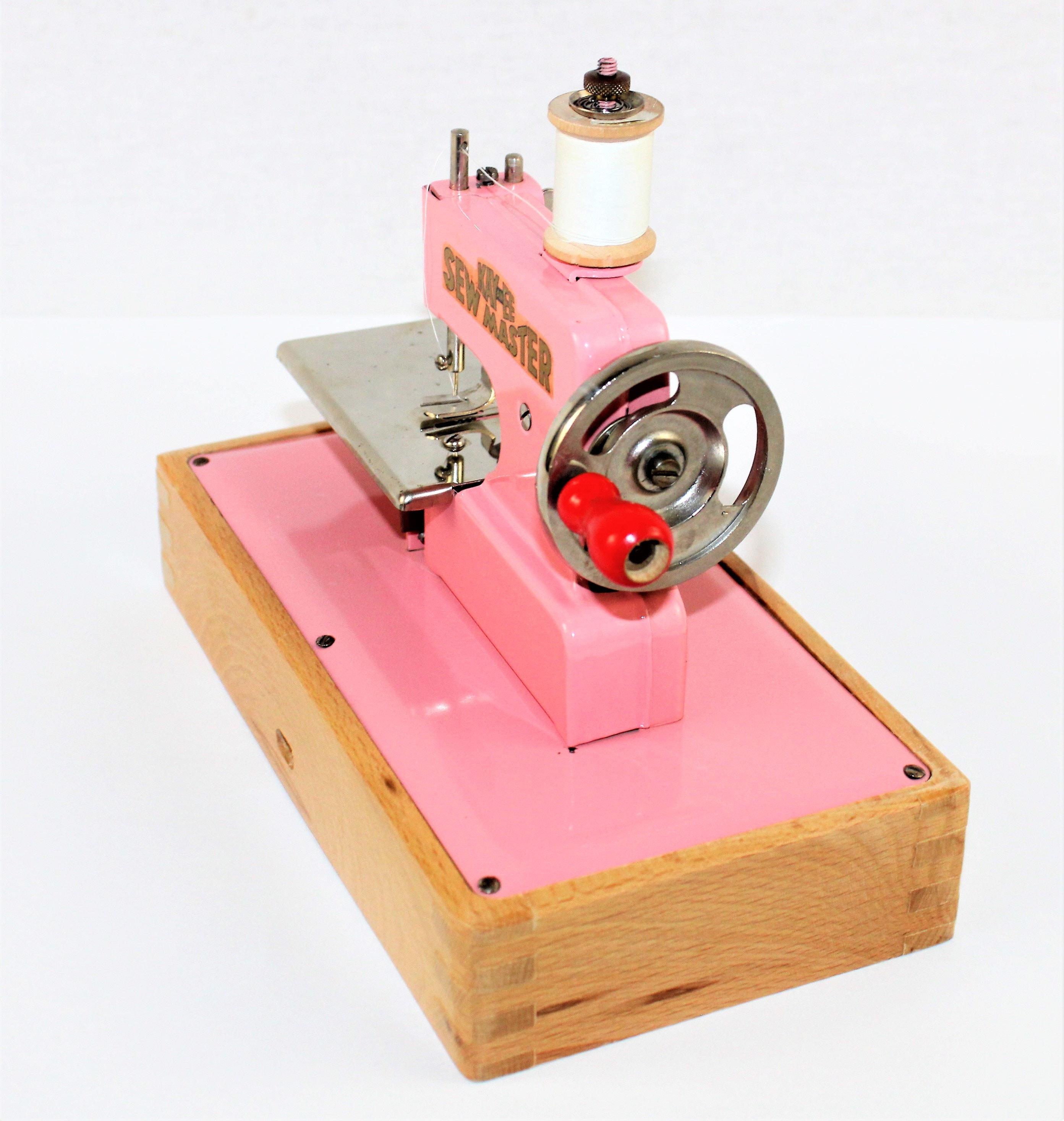 1945 KAYanEE, SEW MASTER Child’s Sewing Machine, Pink Sewing Machine