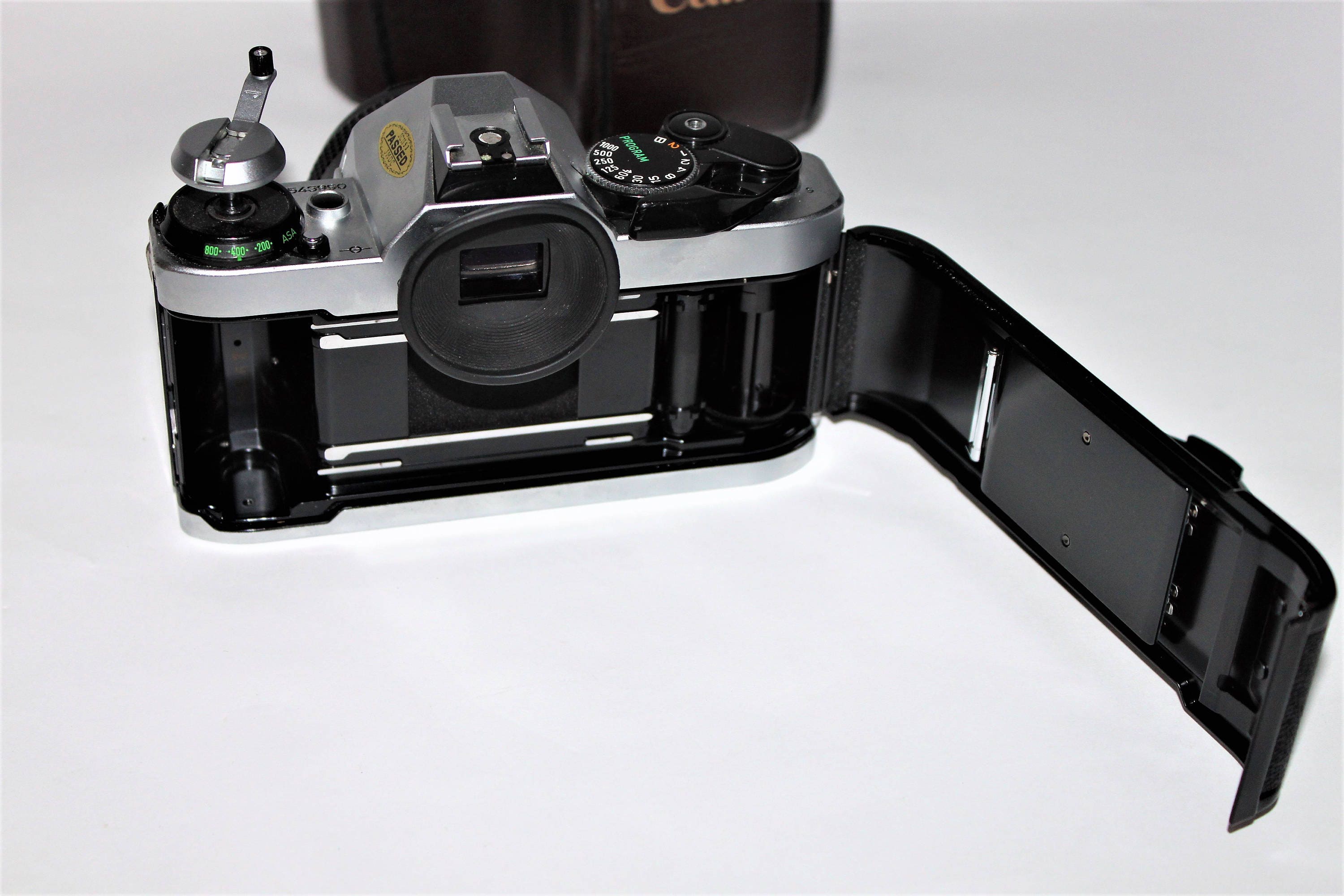 Vintage 1980s Canon AE-1 35mm Film Camera with Leather Case