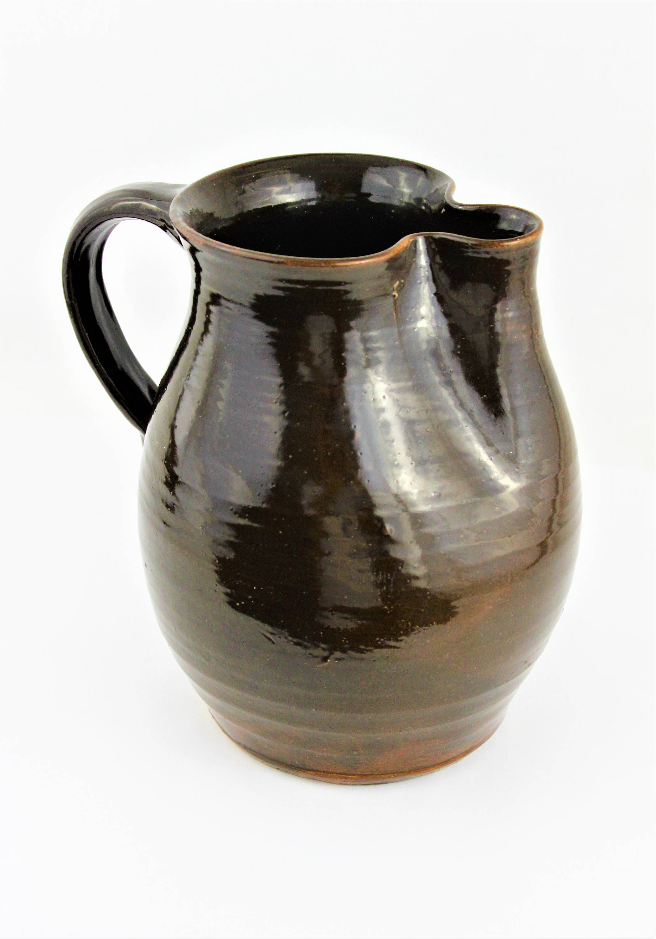 Antique Earthenware Pitcher with Deep Brown Glaze and a Pinch Spout