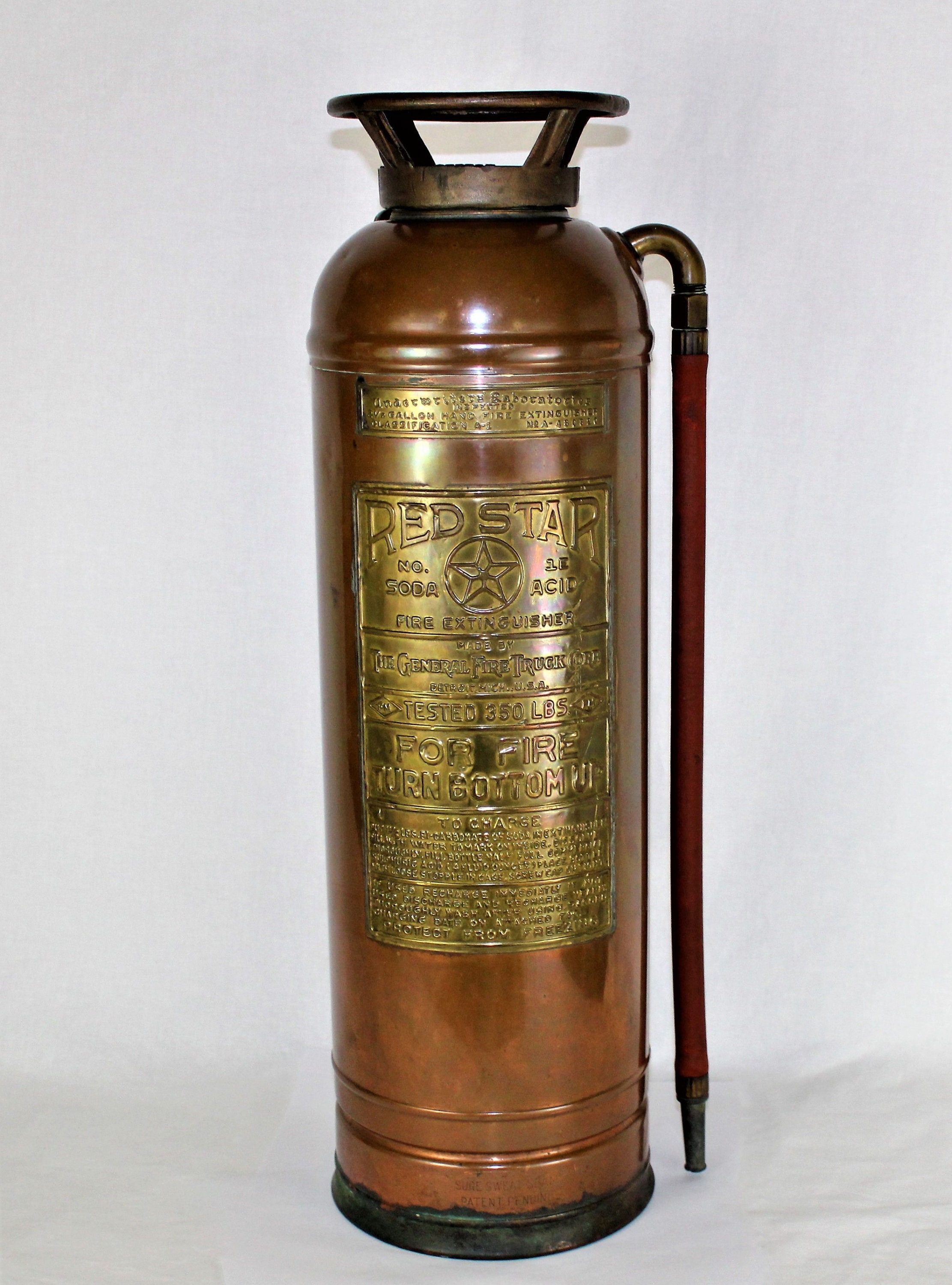 Antique RED STAR Fire Extinguisher made by General Fire Truck Corp