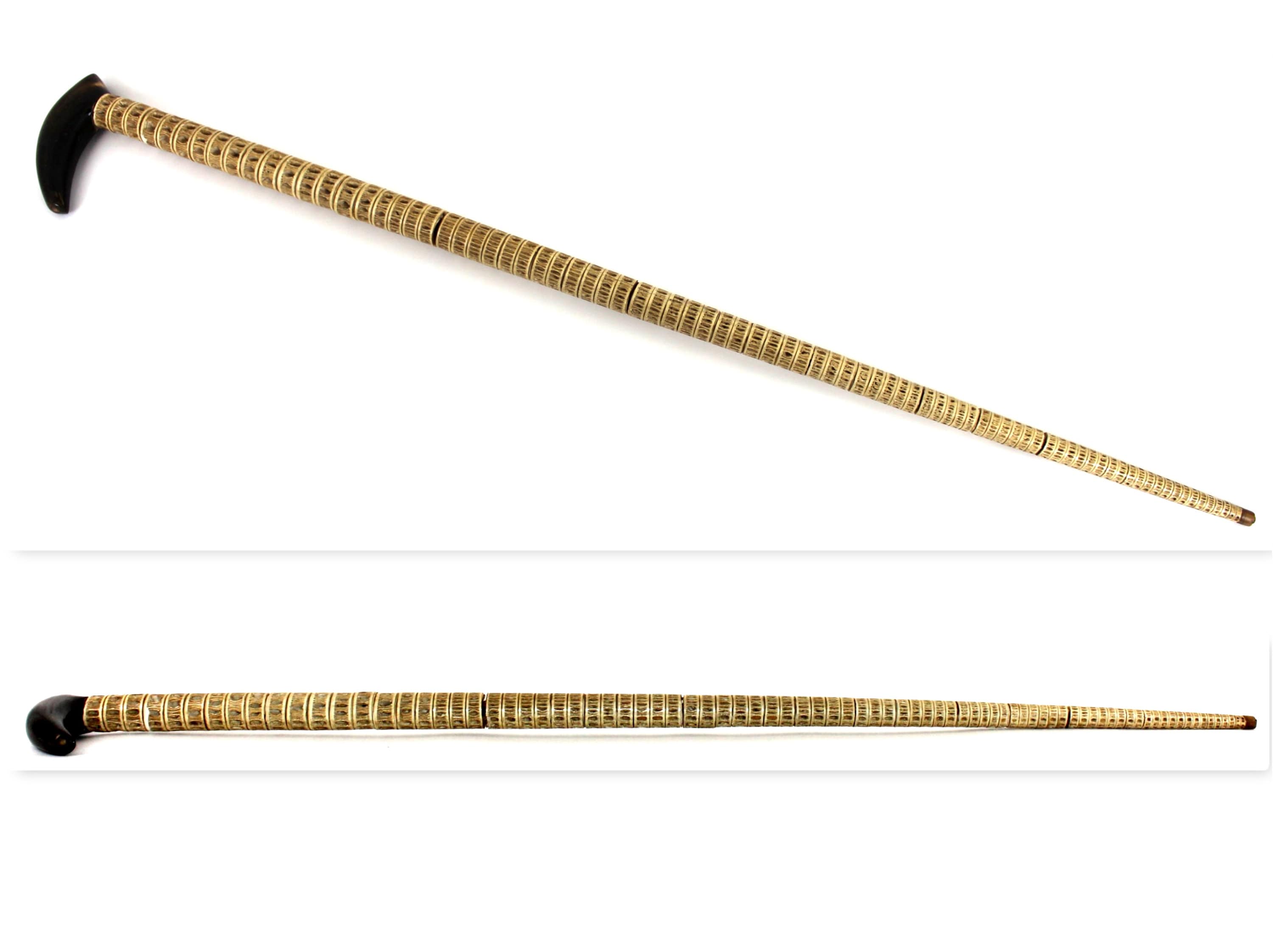 Lot - Four turn-of-the-century men's walking sticks: shark spine