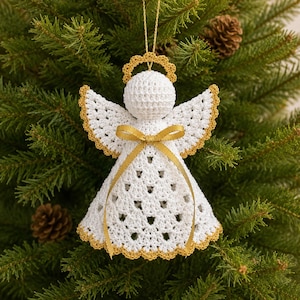 May include: A white crocheted angel ornament featuring a gold-trimmed halo, gold-trimmed wings, and a gold-trimmed hem. The angel is adorned with a gold satin ribbon tied in a bow at the waist and hangs from a thin gold string for display purposes.