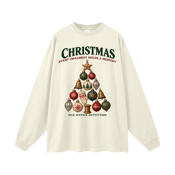 Milk Tea long-sleeve shirt printed with an heirloom ornament tree on a spool base with a wooden star and the words Christmas, Every Ornament Holds a Memory.