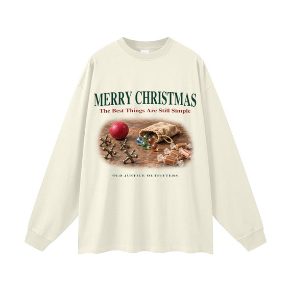 Milk Tea long-sleeve shirt printed with old-fashioned jacks, marbles and Christmas candy and the words The Best Things Are Still Simple.