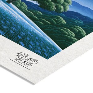 Close-up of the printed signature on the fine-art giclée paper of the Mountain Sun Meadow print