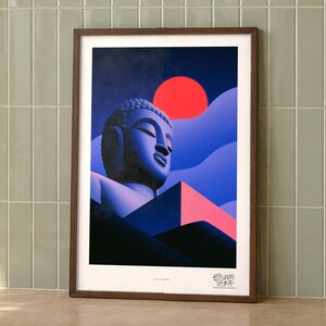Serene Buddha art print on a wall, room view