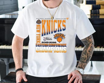 Camiseta de campeones de la Conferencia Este, gráfico del torneo de baloncesto de 2026, ropa negra para aficionados de Nueva York.