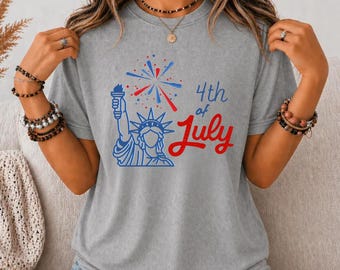 Camiseta de la Estatua de la Libertad, estampado de fuegos artificiales del 4 de julio, ropa blanca para fiestas patrióticas.