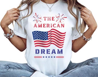 Camiseta "El sueño americano", estampado de la bandera de EE. UU., ropa patriótica blanca que muestra el orgullo de Estados Unidos.