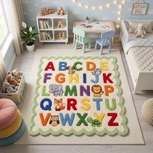 May include: A rectangular area rug with a scalloped light green border featuring the alphabet in colorful, raised letters. Each letter is paired with a small, cartoon-style animal illustration, including a dog, cat, elephant, lion, fox, owl, and turtle.