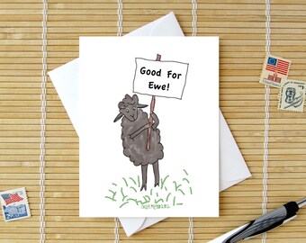 Sheep Holding A Sign Card // Choose Caption: Good For Ewe, Happy Birthday, Thank You // white or black sheep // pun or no pun