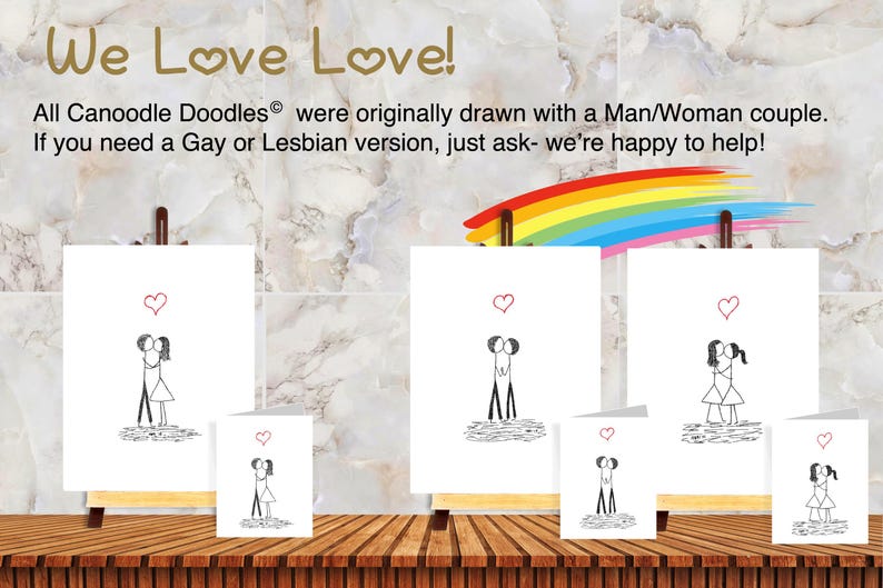 May include: Three white greeting cards and three matching prints on wooden easels, each featuring a black ink stick figure couple kissing under a red heart. The text reads: We Love Love! All Canoodle Doodles were originally drawn with a couple.