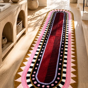 Handgetuft wollen vloerkleed modern geometrisch roze bordeauxrood statementtapijt