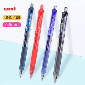 May include: Four Uni-ball Signo RT retractable gel pens in blue, red, purple, and black. Each pen features a transparent barrel, a 0.5mm tip, and a pocket clip. The text UMN-105 and 0.5mm is visible. The pens have a consistent design with a clear cap.