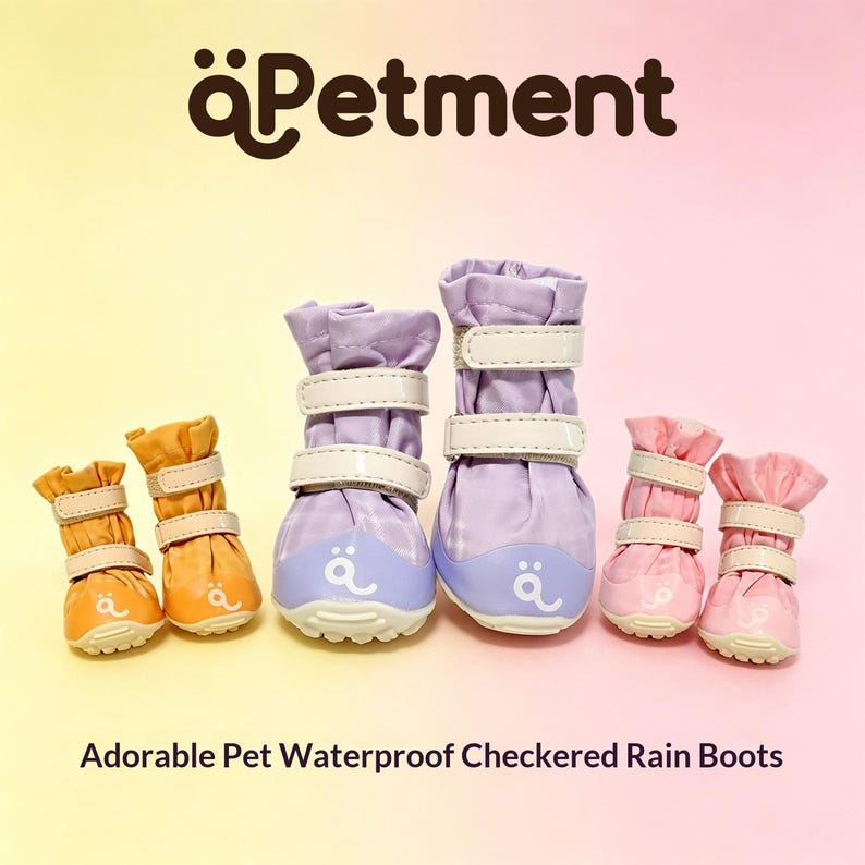 May include: Three pairs of pet rain boots in orange, lavender, and pink, each featuring a subtle checkered pattern, two white hook-and-loop straps, and a white logo on the toe. The text "&auml;Petment" and "Adorable Pet Waterproof Checkered Rain Boots" appear.