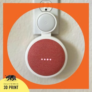 Google Nest mini (2nd gen) outlet mount • white, black, gray, and orange