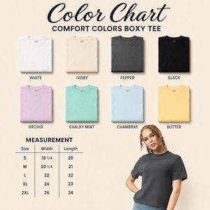 May include: A color chart for Comfort Colors boxy t-shirts displaying eight folded shirts in white, ivory, pepper, black, orchid, chalky mint, chambray, and butter. A measurement table lists widths and lengths in inches for sizes S to 2XL.