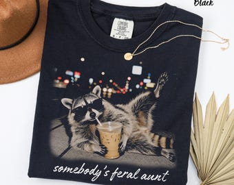Somebody’s Feral Aunt Comfort Colors Shirt, Funny Raccoon Tee, Cool Auntie Gift, New Aunt Gift, Raccoon Coffee Shirt