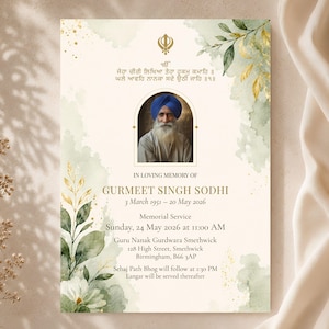 Peut inclure: Une carte d'invitation pour un service commémoratif avec le portrait d'un homme portant un turban bleu et une barbe blanche, encadré de feuilles aquarelles vertes et dorées. Le texte indique le nom Gurmeet Singh Sodhi et les détails.