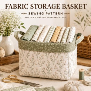 May include: A rectangular fabric storage basket with a cream base featuring a delicate green and brown sprig pattern and a solid green top band. The basket is filled with folded fabric rolls in various patterns including green, cream, and yellow.