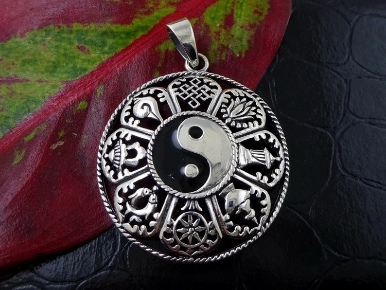 buddhist symbol pendant