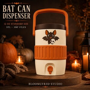 May include: A cream-colored cylindrical can dispenser with an orange handle and a matching orange textured grip band. The front features a graphic of a brown bat holding a white skull. Text reads BAT CAN DISPENSER 12 OZ STANDARD SIZE STL - 3MF FILES.