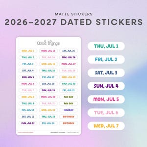 May include: A sheet of matte stickers titled 2026-2027 DATED STICKERS with the header Good things. The sheet contains rows of individual date labels in various colours, including days of the week and dates from July 1 to July 31, plus extra labels.