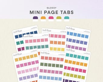 May include: Glossy mini page tabs by Good Things featuring multiple sheets of adhesive labels in various colors including blue, pink, orange, yellow, green, and purple. Each sheet contains rows of rectangular tabs with white borders.
