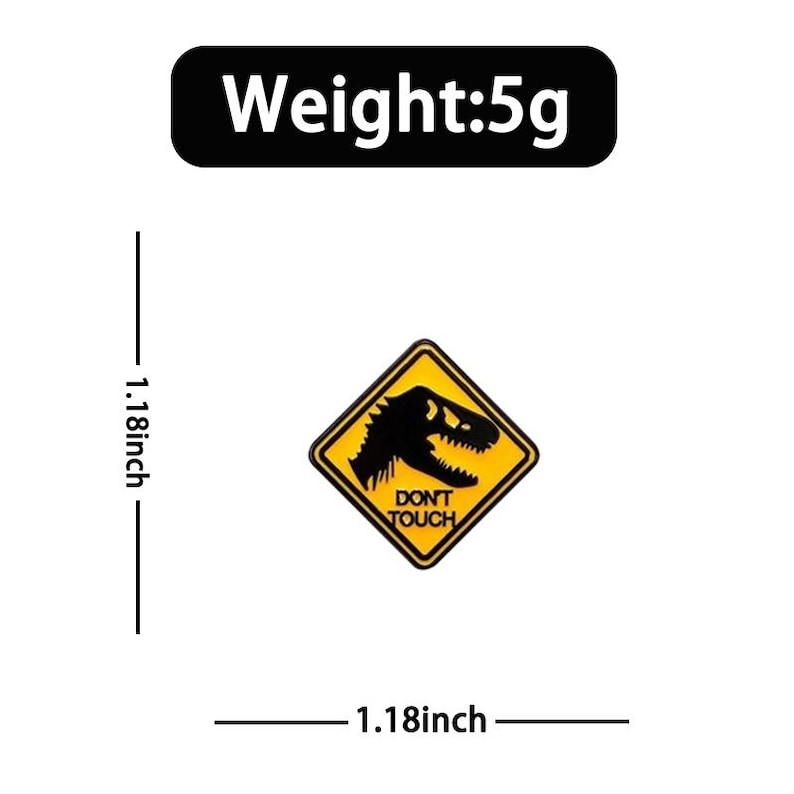 May include: A diamond-shaped yellow and black enamel pin featuring a silhouette of a dinosaur head and the text "DON'T TOUCH". The pin measures 1.18 inches by 1.18 inches and has a weight of 5g as indicated by the visible measurement labels.