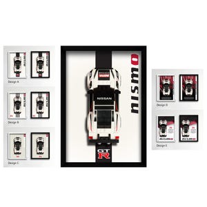 May include: A framed wall art display featuring a top-down view of a white Nissan GT-R Nismo model car. The artwork includes the text NISSAN, NISMO, and GT-R in red and black. The collection showcases five distinct design variations labeled A through E.