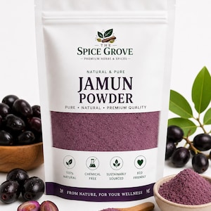 May include: A white stand-up pouch of The Spice Grove Jamun Powder with purple powder visible through a clear window. The label features text including Natural & Pure, 100% Natural, Chemical Free, Sustainably Sourced, and Eco Friendly icons.